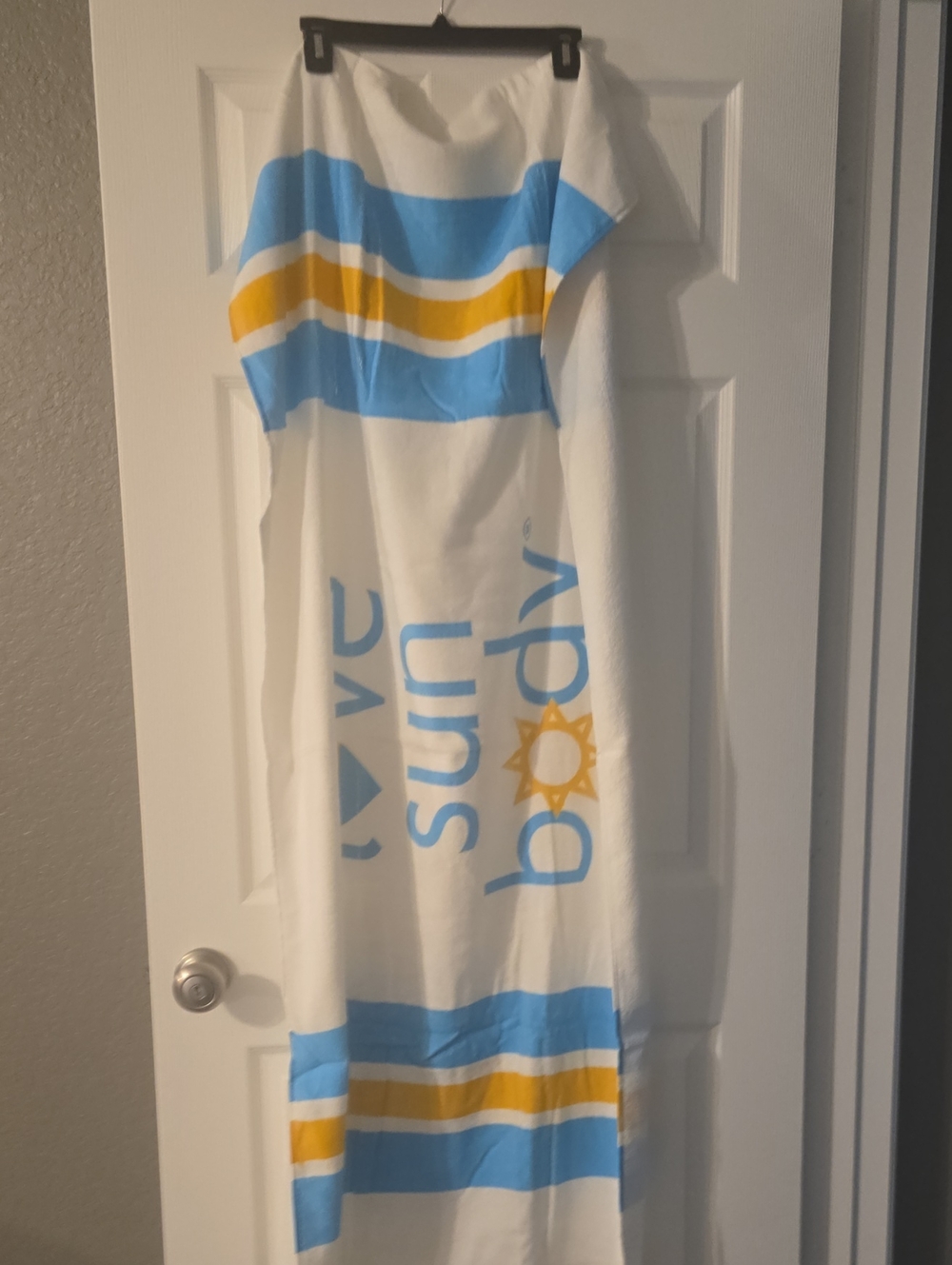 White Beach Towel with Blue and Yellow Stripes